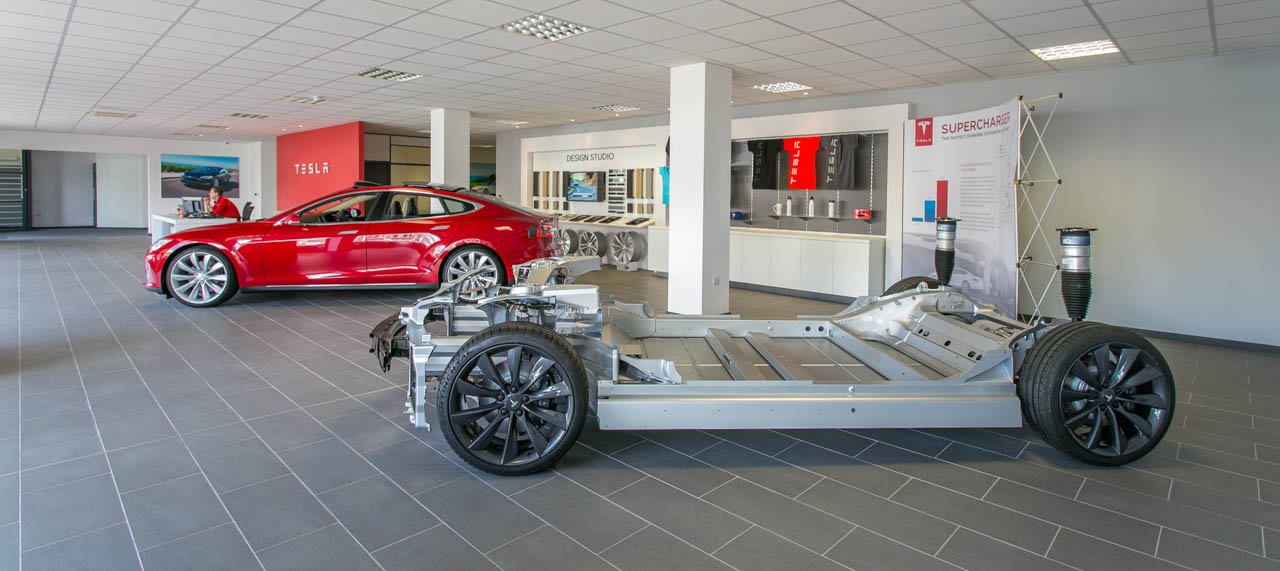 Tesla Staff Interaction Photography